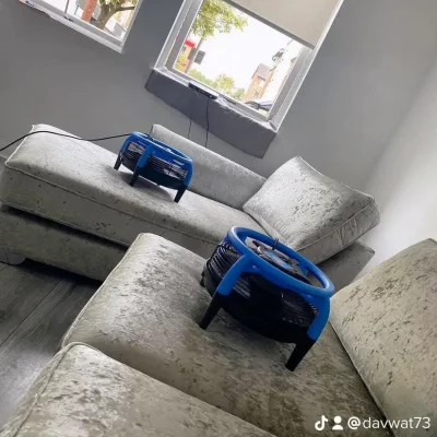 Cleaning equipment and accessories laid out, including hoses and nozzles, emphasizing preparedness and the professional nature of the on-site service.