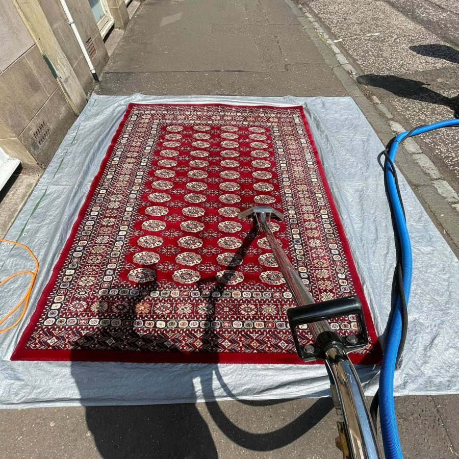 Oriental rug cleaning using specialist equipment.
